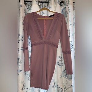 Form fitting low neck purple dress
